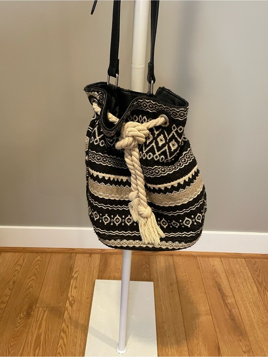 JustFab Handbags - JustFab Black and Cream Woven Drawstring Shoulder Bag